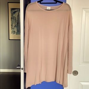 A line to neck with peekaboo sleeve